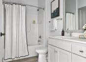 Thumbnail 8 of 33 - savor apartments bathroom with tub and shower combo
