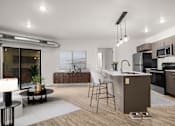 Thumbnail 28 of 28 - A modern kitchen with a dining table and chairs.