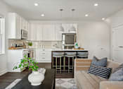Thumbnail 21 of 49 - A modern kitchen with white cabinets and a wooden floor.