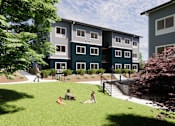 Thumbnail 1 of 4 - A group of people are sitting on the grass in front of a building.