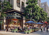 Thumbnail 5 of 6 - A busy street scene with people walking and sitting at tables outside a restaurant named Saki & Stone.