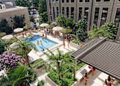 Thumbnail 1 of 6 - A pool surrounded by palm trees and umbrellas.