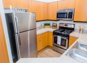 Thumbnail 21 of 25 - Fully Equipped Kitchen With Modern Appliances at Medici Apartment Homes, Bermuda Dunes, CA, 92203