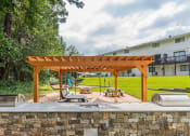 Thumbnail 23 of 35 - Firepit Grill Picnic Area  at Pinewood Townhomes, Tucker, GA, 30084