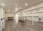 Thumbnail 66 of 66 - Laundry center with a folding tables at Fields at Peachtree Corners, Norcross, 30092