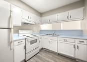 Thumbnail 19 of 29 - Classic Kitchen at 2000 Oasis  Apartments, Atlanta, GA