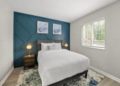 Thumbnail 16 of 60 - Furnished Bedroom with cozy bed at the 505 Collection in Atlanta, Georgia.