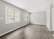 Thumbnail 11 of 35 - Spacious Living Room New Flooring Throughout  at Pinewood Townhomes, Tucker, GA