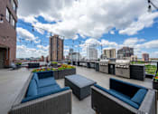 Thumbnail 14 of 24 - 7th Floor Sundeck Lounge and BBQ Area at ELEVATE Apartment Homes, MN 55403
