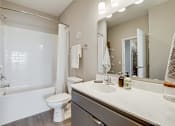 Thumbnail 13 of 36 - Bathroom With Bathtub at Maven Apartments, Burnsville, MN