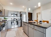 Thumbnail 3 of 36 - Kitchen Sink With Faucet at Maven Apartments, Burnsville, MN, 55337