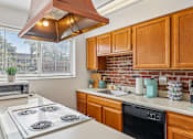 Thumbnail 8 of 43 - Kitchen in a 2 bedroom at Georgetown of St. Louis Apartments