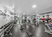Thumbnail 26 of 43 - Georgetown of St. Louis Apartments fitness center equipped with Precore and Peloton equipment