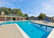 Thumbnail 18 of 43 - A large outdoor swimming pool two of two outside of the clubhouse at Georgetown of St. Louis Apartments