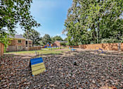 Thumbnail 32 of 43 - Fenced in dog park at Georgetown of St. Louis Apartments