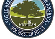 Thumbnail 31 of 33 - Badge reading Top 10 Best Places to Live in America with #1 in Michigan and Rochester Hills.