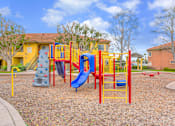 Thumbnail 8 of 13 - A playground at Sunbow Villas Apartments