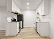 Thumbnail 11 of 36 - A modern kitchen with white cabinets and black appliances.