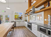 Thumbnail 17 of 38 - Community Room Kitchen