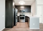 Thumbnail 1 of 28 - 1 Bedroom Unit Kitchen at Central Park, La Mesa, 91942