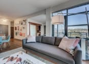 Thumbnail 17 of 51 - Dining Table Along Side With Living Room at Equinox, Seattle, WA, 98102