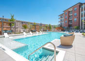 Thumbnail 26 of 35 - the swimming pool at the district flats apartments in lenexa