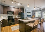 Thumbnail 36 of 38 - Gourmet Kitchen With Island at SkyStone Apartments, Albuquerque, New Mexico