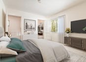 Thumbnail 21 of 55 - A bedroom with a large bed and a flat screen TV mounted on the wall.