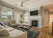 Thumbnail 33 of 38 - Living Room With Fireplace at SkyStone Apartments, Albuquerque, NM, 87114