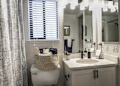 Thumbnail 8 of 27 - Bathroom With Vanity Lights at Reedhouse Apartments, Boise, ID, 83706