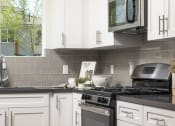 Thumbnail 5 of 20 - Kitchen at Sorano Apartments