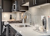 Thumbnail 33 of 46 - Radius Apartments Model Kitchen