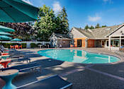 Thumbnail 33 of 48 - Outdoor swimming pool with surrounding patio furniture at Canyon Creek Apartments, Wilsonville, Oregon
