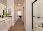 Thumbnail 22 of 59 - model apartment bathroom with shower stall at Element 12 Apartments, Henderson NV