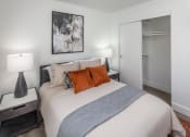 Thumbnail 13 of 38 - Bedroom with a large bed and a closet at Arbor Heights, Tigard, 97224