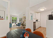 Thumbnail 16 of 55 - A modern kitchen with a dining table and chairs.