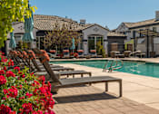 Thumbnail 9 of 38 - Poolside Sundeck at SkyStone Apartments, Albuquerque, NM