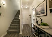 Thumbnail 18 of 38 - a staircase leading up to a room with carpeted stairs