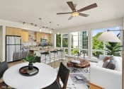 Thumbnail 5 of 30 - a living and dining area with a large window and a ceiling fanat Allez, Redmond, WA 98052