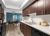 Thumbnail 1 of 36 - Model Apartment Kitchen at Central Park East, Bellevue, 98007