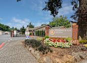 Thumbnail 28 of 30 - The entrance to Carriage Park apartments