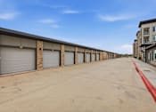 Thumbnail 20 of 55 - A long row of garage doors are closed.