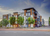 Thumbnail 2 of 25 - exterior of 644 City Station with trees in the front