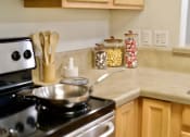 Thumbnail 24 of 37 - a kitchen with a stove and a sink
