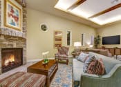 Thumbnail 10 of 30 - Clubhouse with Fireplace at Avino in San Diego, CA 92130