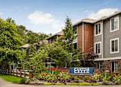 Thumbnail 48 of 48 - Property entrance sign with landscaping at Canyon Creek Apartments, Wilsonville, 97070