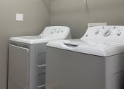 Thumbnail 44 of 44 - full size washer and dryer in laundry room