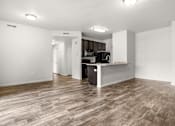 Thumbnail 7 of 29 - A kitchen area with a counter and cabinets.