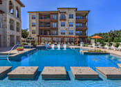 Thumbnail 30 of 41 - Relaxing pool with tanning ledge