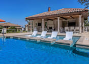 Thumbnail 29 of 41 - Relaxing pool with tanning ledge